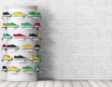 Many Multicolour Sneakers Footwear Exhibition on Shelf for Sale